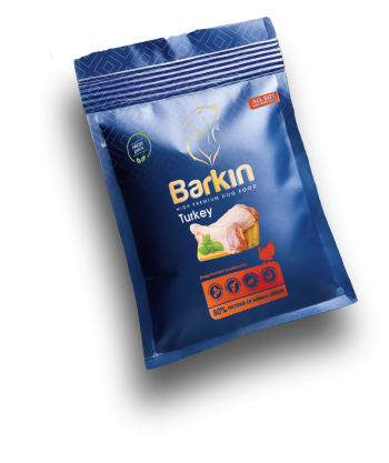 Busta di croccantini per cani Barkin Turkey, confezione blu scuro con accenti arancioni.