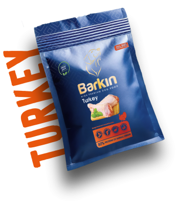 Busta di croccantini per cani Barkin Turkey, confezione blu scuro con accenti arancioni.